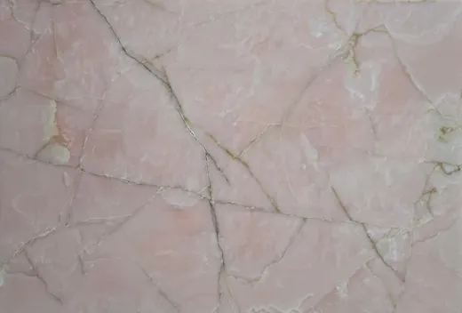 Baby pink onyx slab with fine crystal veining